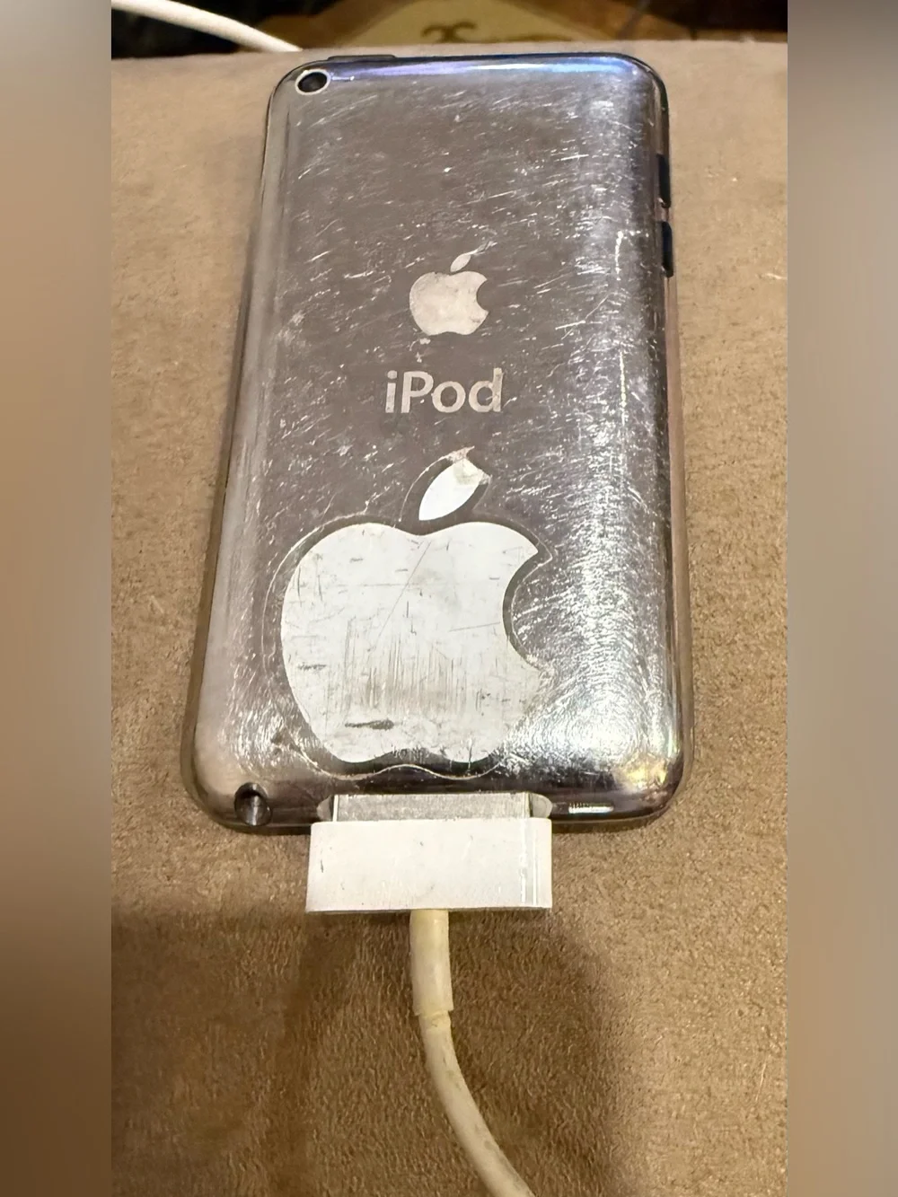 Apple iPod touch 4th Generation w/charging cord.